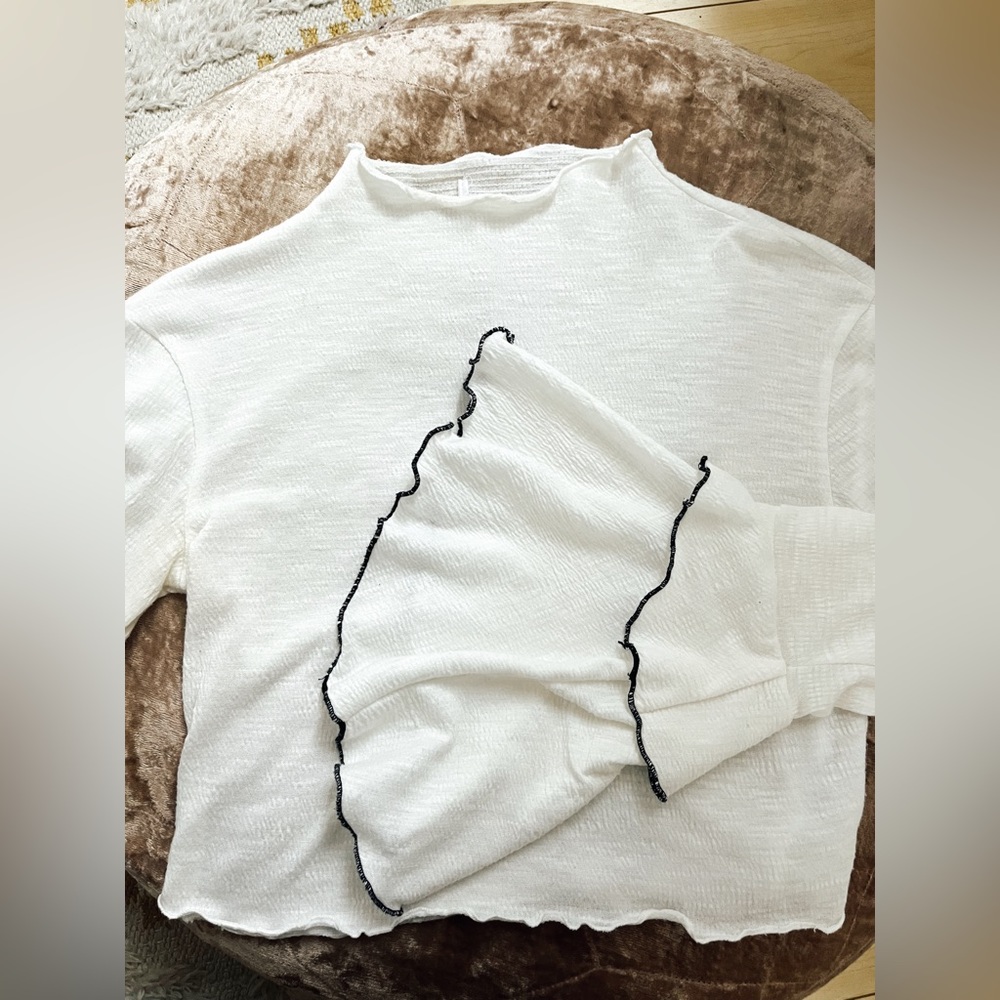 Mock neck trumpet sleeve white top